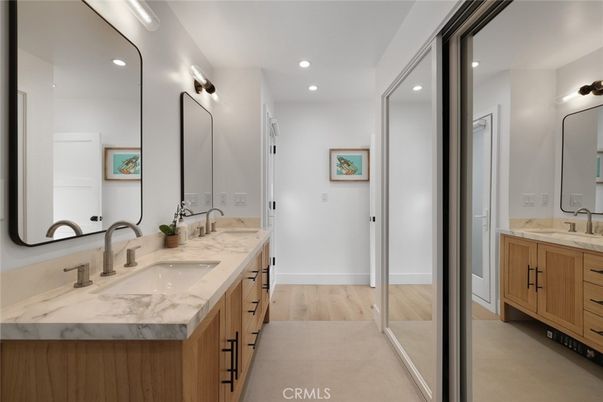 Bathroom, Dual Sink Vanities, Interior, Recessed Lighting, Wood Texture Flooring