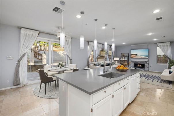 Dining room, Fireplace, Interior, Kitchen, Living room, Pendant Lights, Recessed Lighting, Stainless Steel Appliances