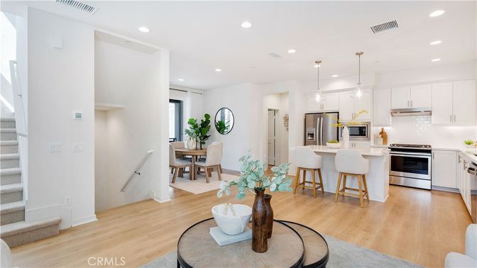 Dining room, Interior, Kitchen, Pendant Lights, Recessed Lighting, Stainless Steel Appliances, Wood Texture Flooring