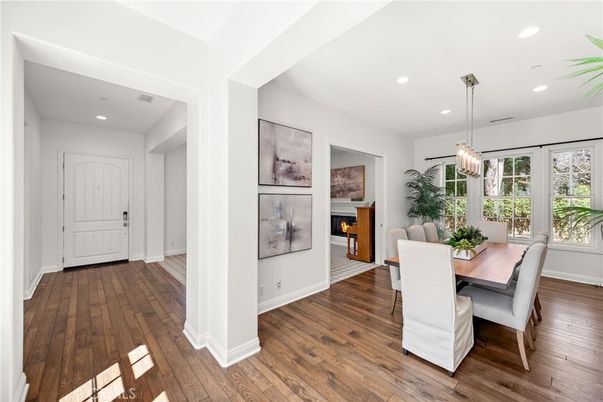 Dining room, Fireplace, Interior, Pendant Lights, Recessed Lighting, Wood Texture Flooring