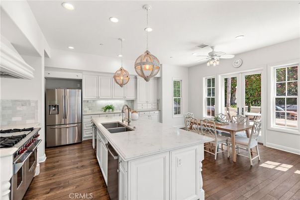 Dining room, Interior, Kitchen, Pendant Lights, Recessed Lighting, Stainless Steel Appliances, Wood Texture Flooring