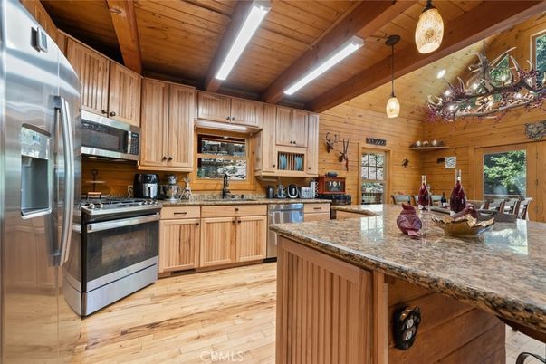 Chandelier, Interior, Kitchen, Pendant Lights, Stainless Steel Appliances, Wooden Beams, Wooden Ceilings, Wood Texture Flooring, Wooden Walls
