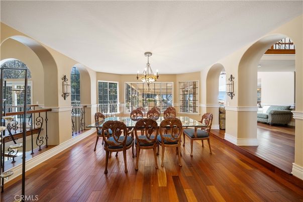 Chandelier, Dining room, Fireplace, Interior, Recessed Lighting, Wood Texture Flooring