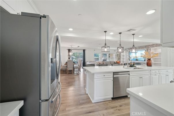 Dining room, Interior, Kitchen, Living room, Pendant Lights, Recessed Lighting, Stainless Steel Appliances, Wood Texture Flooring
