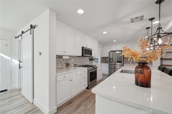 Interior, Kitchen, Pendant Lights, Recessed Lighting, Stainless Steel Appliances, Wood Texture Flooring