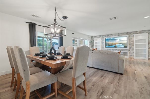 Dining room, Interior, Living room, Pendant Lights, Recessed Lighting, Stone Walls, Wood Texture Flooring
