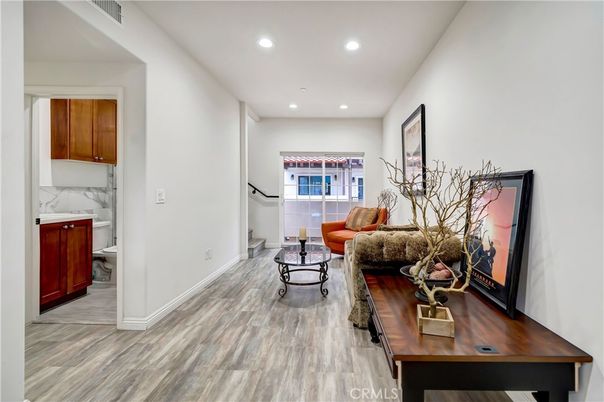 Interior, Living room, Marble Walls, Recessed Lighting, Wood Texture Flooring