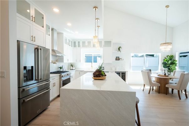 Dining room, Interior, Kitchen, Pendant Lights, Recessed Lighting, Stainless Steel Appliances, Wood Texture Flooring