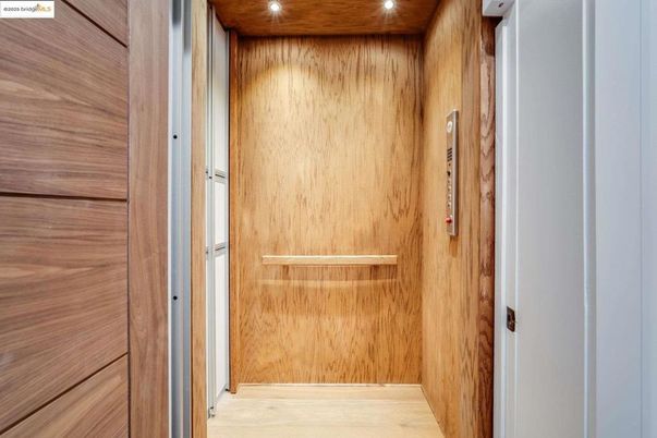 Elevator, Interior, Recessed Lighting, Wooden Ceilings, Wood Texture Flooring, Wooden Walls