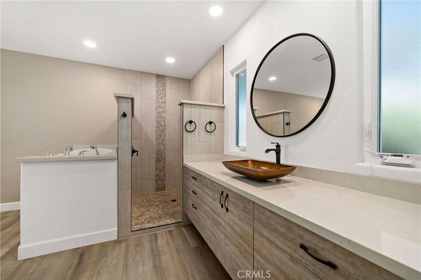 Bathroom, Dual Sink Vanities, Glass Shower, Interior, Recessed Lighting, Wood Texture Flooring