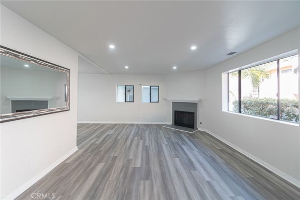 Empty room, Fireplace, Interior, Recessed Lighting, Wood Texture Flooring