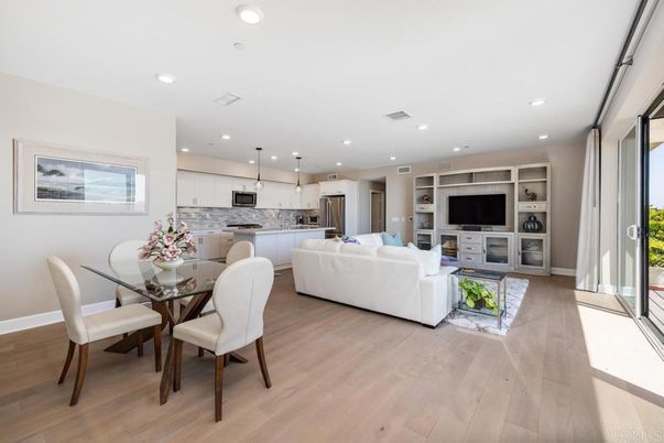 Dining room, Interior, Kitchen, Living room, Pendant Lights, Recessed Lighting, Stainless Steel Appliances, Wood Texture Flooring