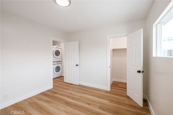 Empty room, Interior, Utility Closets, Washer, Wood Texture Flooring