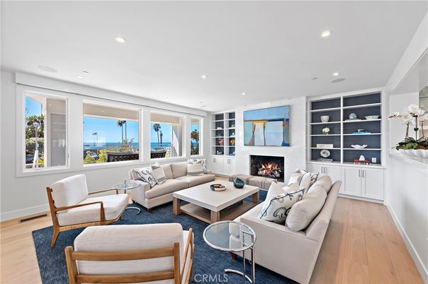 Fireplace, Interior, Living room, Recessed Lighting, Water, Wood Texture Flooring
