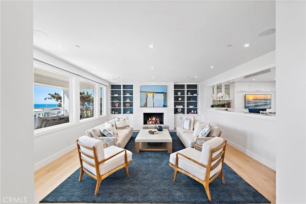 Fireplace, Interior, Living room, Recessed Lighting, Water, Wood Texture Flooring