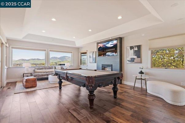 Billiard Table, Fireplace, Game Room, Interior, Recessed Lighting, Wood Texture Flooring