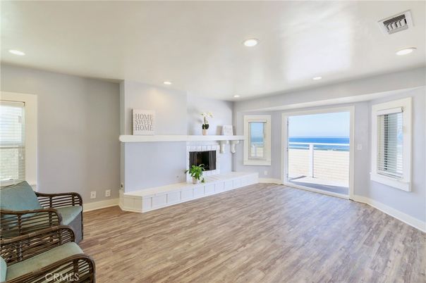Empty room, Fireplace, Interior, Recessed Lighting, Water, Wood Texture Flooring