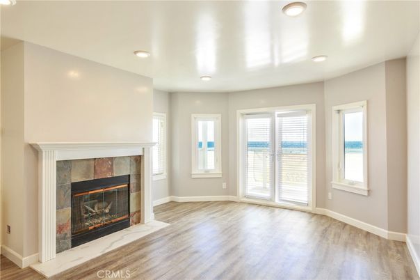 Empty room, Fireplace, Interior, Recessed Lighting, Wood Texture Flooring