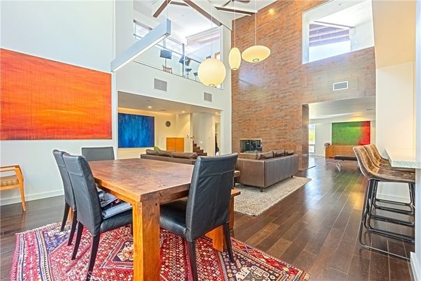 Dining room, Fireplace, Interior, Living room, Pendant Lights, Recessed Lighting, Stone Walls, Wood Texture Flooring