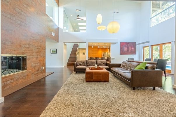 Fireplace, Interior, Living room, Pendant Lights, Recessed Lighting, Stone Walls, Wood Texture Flooring