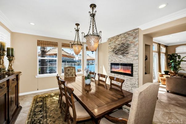 Dining room, Fireplace, Interior, Pendant Lights, Recessed Lighting, Stone Walls, Water