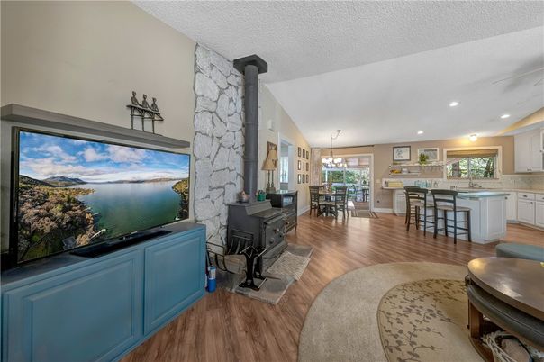 Dining room, Fireplace, Interior, Kitchen, Pendant Lights, Recessed Lighting, Stone Walls, Wood Texture Flooring
