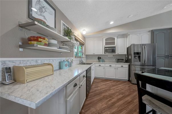 Interior, Kitchen, Recessed Lighting, Stainless Steel Appliances, Wood Texture Flooring