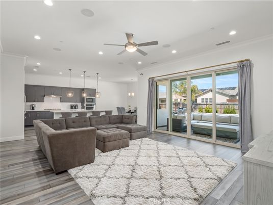 Dining room, Interior, Kitchen, Living room, Pendant Lights, Recessed Lighting, Stainless Steel Appliances, Wood Texture Flooring