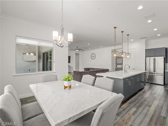 Dining room, Interior, Kitchen, Pendant Lights, Recessed Lighting, Stainless Steel Appliances, Wood Texture Flooring