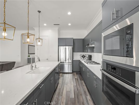 Interior, Kitchen, Pendant Lights, Recessed Lighting, Stainless Steel Appliances, Wood Texture Flooring