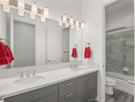 Bathroom, Dual Sink Vanities, Glass Shower, Interior, Wood Texture Flooring