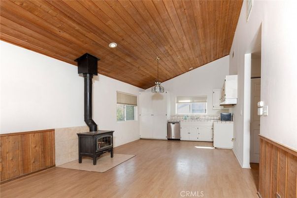 Fireplace, Interior, Kitchen, Pendant Lights, Stainless Steel Appliances, Wooden Ceilings, Wood Texture Flooring