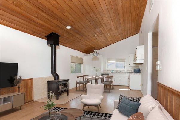 Dining room, Fireplace, Interior, Living room, Pendant Lights, Wooden Ceilings, Wood Texture Flooring