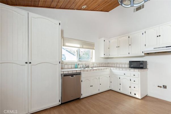 Interior, Kitchen, Tile Countertops, Wooden Ceilings, Wood Texture Flooring