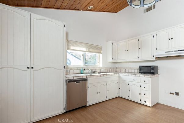 Interior, Kitchen, Tile Countertops, Wooden Ceilings, Wood Texture Flooring