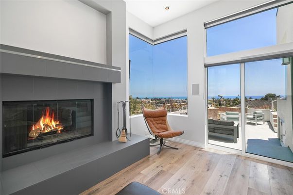Fireplace, Interior, Recessed Lighting, Water, Wood Texture Flooring