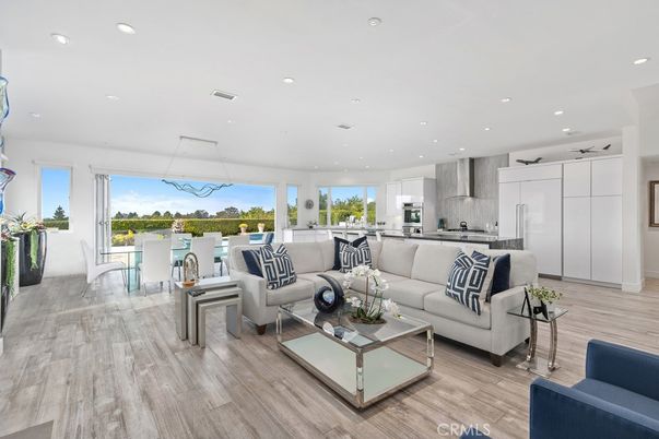 Dining room, Interior, Kitchen, Living room, Pendant Lights, Recessed Lighting, Stainless Steel Appliances, Wood Texture Flooring