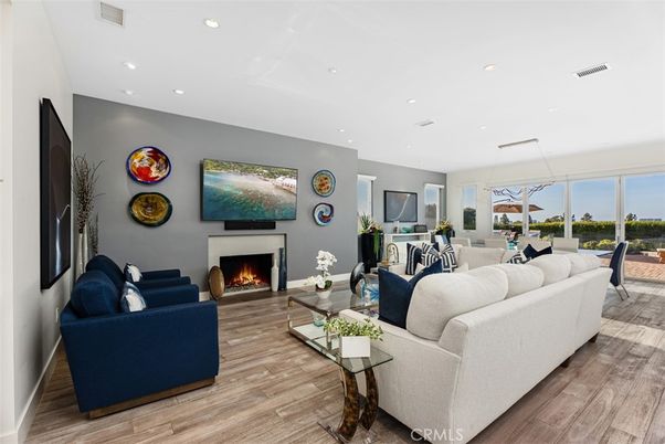 Dining room, Fireplace, Interior, Living room, Pendant Lights, Recessed Lighting, Wood Texture Flooring