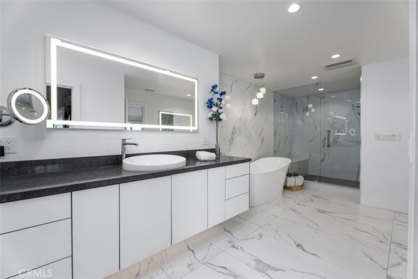 Bathroom, Dual Sink Vanities, Free Standing Baths, Glass Shower, Interior, Marble, Marble Walls, Recessed Lighting