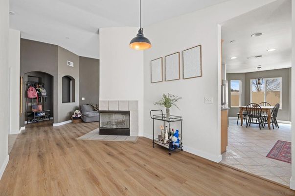 Dining room, Fireplace, Interior, Pendant Lights, Recessed Lighting, Wood Texture Flooring