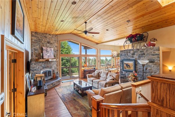 Dining room, Fireplace, Interior, Living room, Pendant Lights, Stone Walls, Wooden Ceilings, Wood Texture Flooring