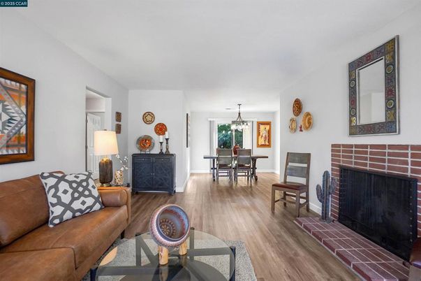 Chandelier, Dining room, Fireplace, Interior, Living room, Pendant Lights, Wood Texture Flooring