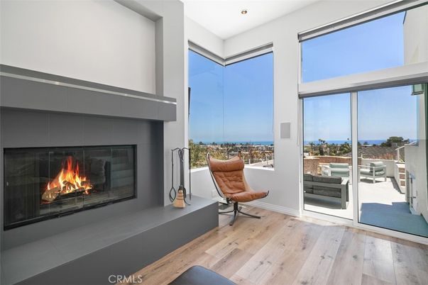 Fireplace, Interior, Recessed Lighting, Water, Wood Texture Flooring