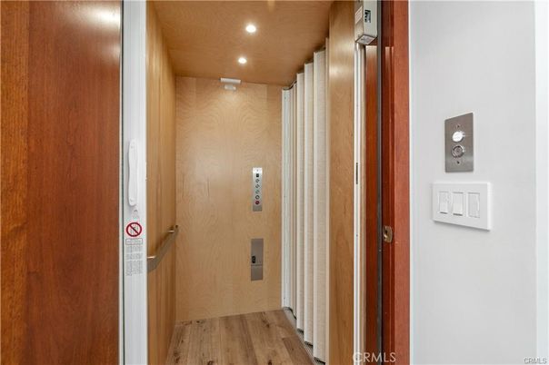 Elevator, Interior, Recessed Lighting, Wood Texture Flooring, Wooden Walls