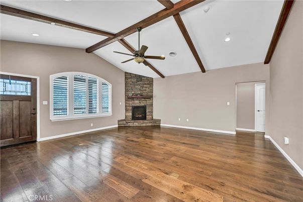 Empty room, Fireplace, Interior, Recessed Lighting, Wooden Beams, Wood Texture Flooring