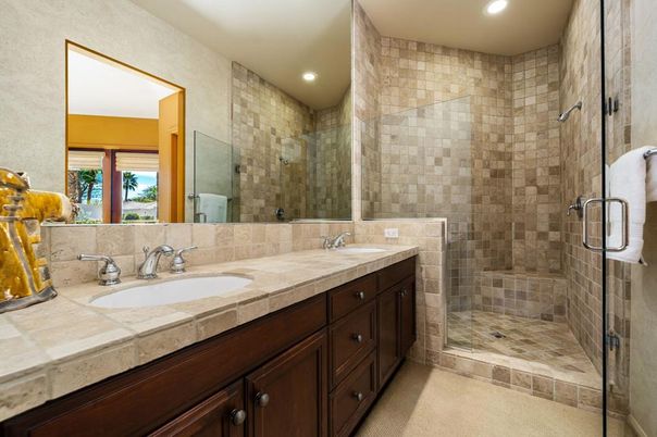 Bathroom, Dual Sink Vanities, Glass Shower, Interior, Recessed Lighting, Stone Walls, Tile Countertops