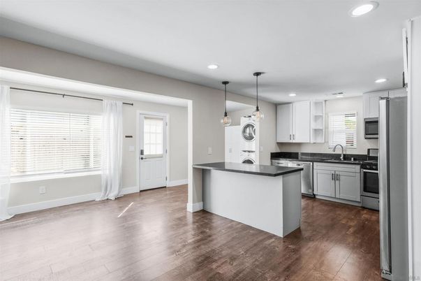 Interior, Kitchen, Pendant Lights, Recessed Lighting, Stainless Steel Appliances, Wood Texture Flooring