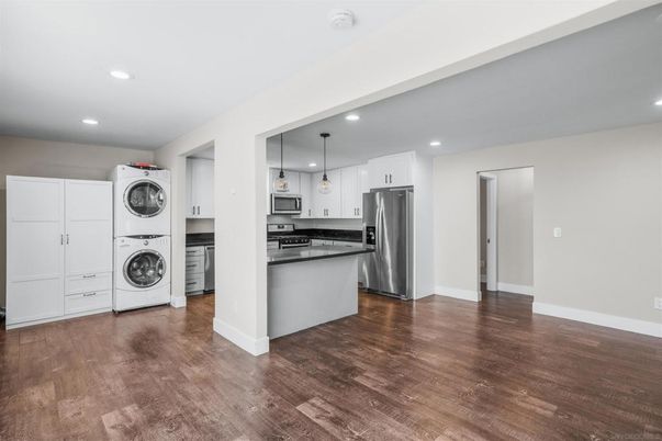 Interior, Kitchen, Pendant Lights, Recessed Lighting, Stainless Steel Appliances, Washer, Wood Texture Flooring