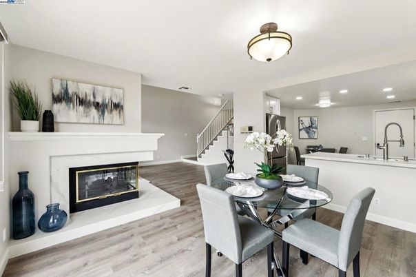 Dining room, Fireplace, Interior, Kitchen, Recessed Lighting, Wood Texture Flooring