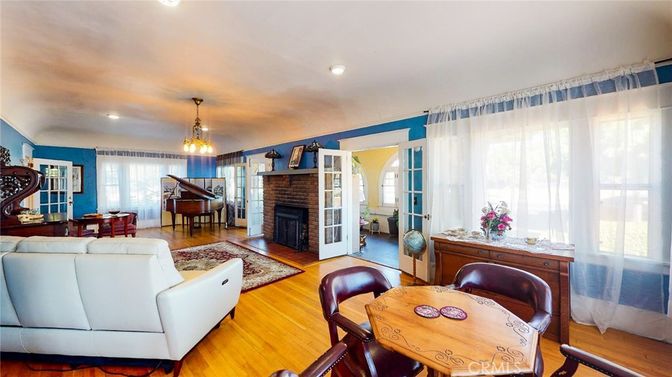 Dining room, Fireplace, Interior, Living room, Pendant Lights, Piano, Recessed Lighting, Wood Texture Flooring
